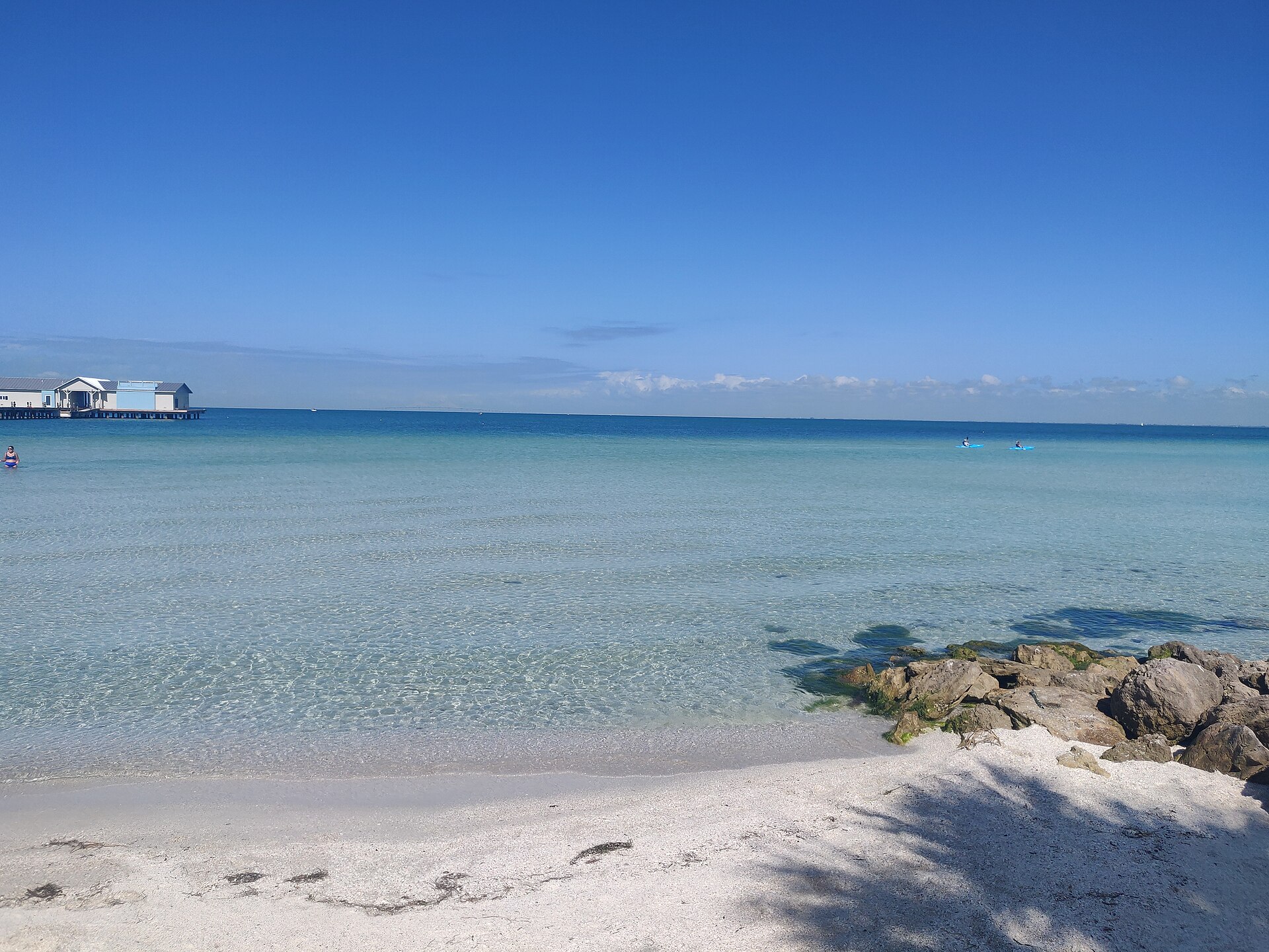 Clear turquoise water and white sand on the Anna Maria Island shoreline